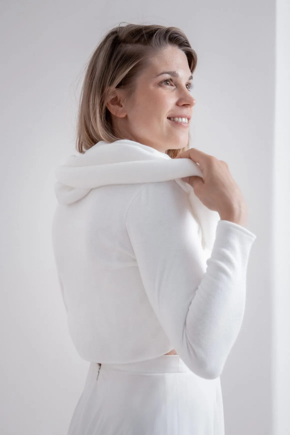 Mini-Pullover mit Perl-Knöpfen